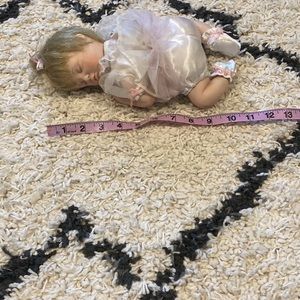 Ashton Drake collectable 1999 sleeping baby girl on belly blonde